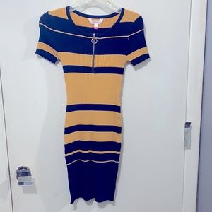 Yellow/gold and black dress size small and never worn
